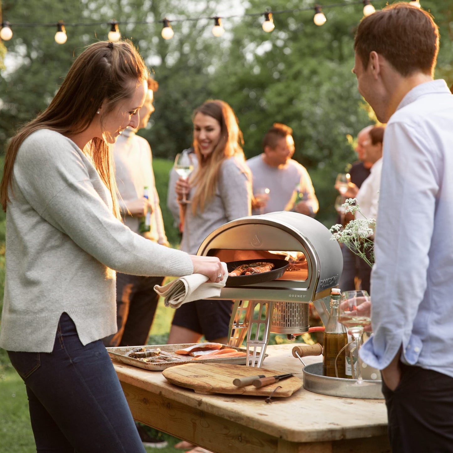 ROCCBOX Gozney Portable Outdoor Pizza Oven - Includes Professional Grade Pizza Peel, Built-In Thermometer and Safe Touch Silicone Jacket - Propane Gas Fired, With Rolling Wood Flame - Grey